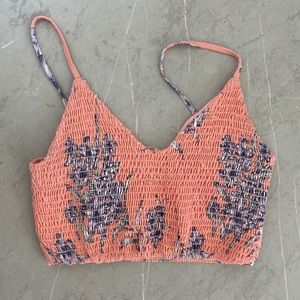 Peach crop top with navy floral print